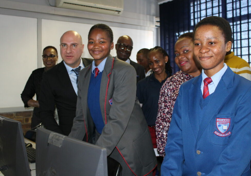 Jiyana computer donation Stavros Nicolaou, far left with students who gratefully received Aspen's donation of computers and tablets.